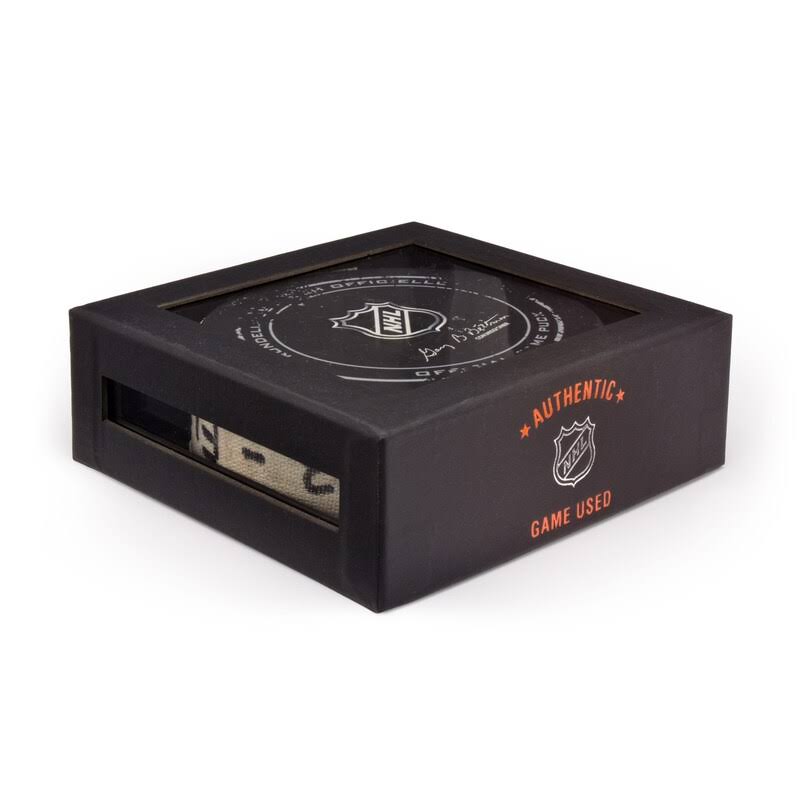 Game-Used Puck Bottle Opener N48077
